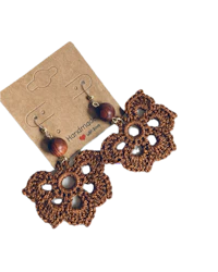 Brown butterfly motif with natural wood and golden accents