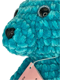 a blue teddy bear with a tag on it